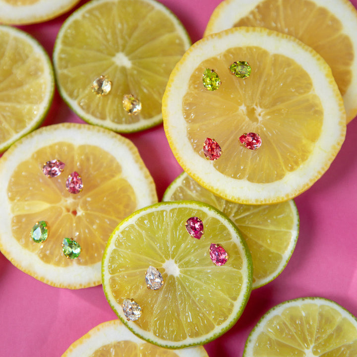 Caroline Svedbom Gold Plated Super Petite Ear Studs in Peridot